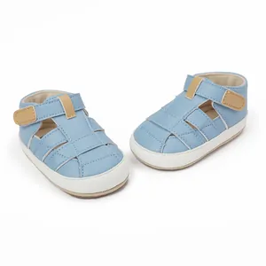 Pair of breathable light blue baby sandals with white soles and tan velcro straps