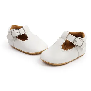 Detailed view of white baby girl princess walker shoes featuring scalloped edges