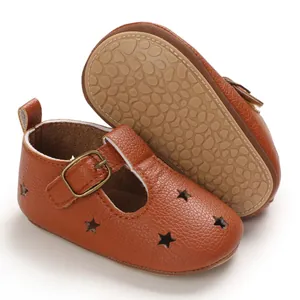 Brown PU leather pre-walker baby shoes with star cutouts and anti-slip pebble sole