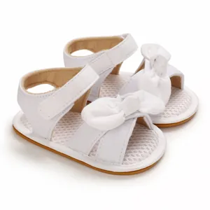 Sandalias blancas de algodón para bebé con lazo y suela de goma suave infantil