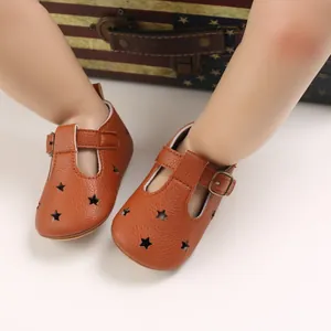 Casual brown PU leather baby pre-walking shoes with star cutouts and metal buckles