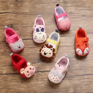 Detailed view of colorful cartoon baby pre-walker shoes with soft soles for infants