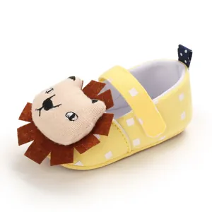 Detailed view of yellow baby walker shoe featuring a 3D cute cartoon lion decoration
