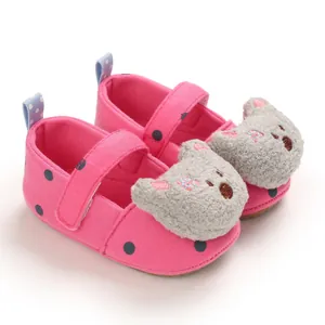 Pink polka dot baby walking shoes with cute plush koala cartoon decoration