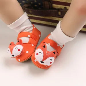 Detailed view of orange baby walking shoes featuring cute 3D fox cartoon design