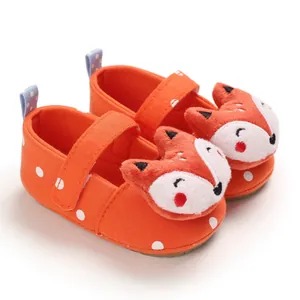 Orange baby walking shoes with cute cartoon fox plush and white polka dots decoration