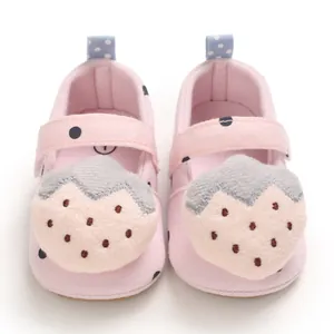 Soft-soled pink baby walker shoes with cute strawberry plush cartoon decoration.
