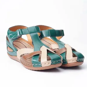 Close-up detail of retro round-toe wedge sandals featuring colorful crossover straps design