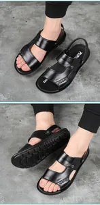 Men's black leather summer sandals with non-slip soles, shown on feet on concrete background