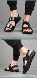 Detail view of men's black leather sandals featuring textured soles and adjustable straps