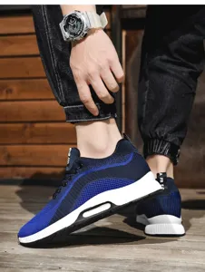 Side view of men's breathable blue mesh flying woven sneakers with thick white soles