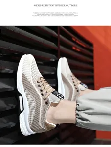 Close-up of lightweight fly-woven men's sports shoe featuring a durable rubber outsole
