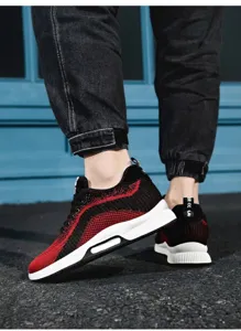 Detailed view of red and black knitted men's sneakers with 6cm height increase