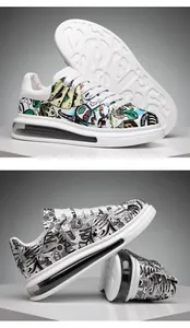 Detail showing colorful and monochrome graffiti print on men's chunky board shoes