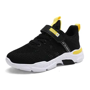 Breathable black mesh boys' running shoes with velcro strap and thick white sole