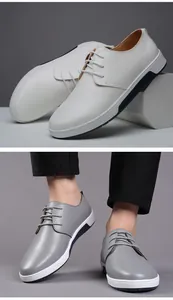 Moderne Business-Freizeitschuhe aus Leder für Herren in Weiß und Grau am Modell