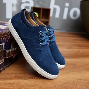 Men's casual deep blue suede board shoes featuring a wide fit design and durable white rubber sole