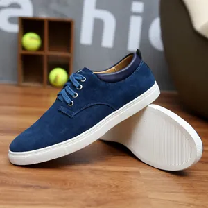 Men's blue suede casual sneakers featuring a clean white rubber sole and lace-up design