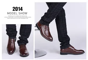 Detailed macro views of brown men's business casual leather shoes worn by model