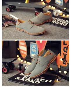 Macro detail view of men's grey suede casual derby shoes featuring non-slip flat soles