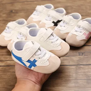 Detail of soft-soled baby walking sneakers with velcro straps in multiple colors
