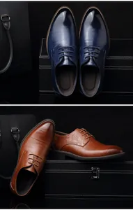 Detail view of premium men's leather Oxford shoes in navy blue and brown colors.