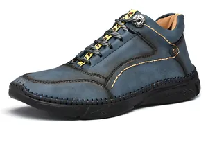Close-up of blue men's casual leather shoes with contrast yellow stitching