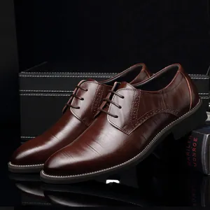 Classic men's brown business casual leather shoes with textured finish and soft sole