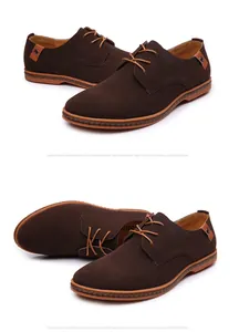 Macro view of brown suede texture and lace-up detail on stylish men's casual shoes