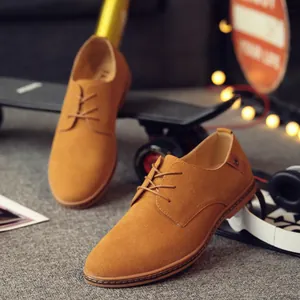 Classic men's tan suede casual derby shoes with non-slip sole in lifestyle setting