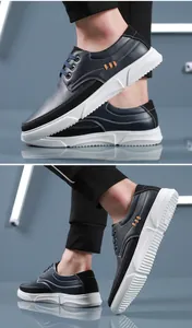 Close-up of stylish men's navy blue leather casual sneakers in large sizes 47-48