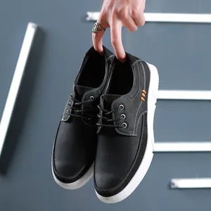Stylish men's black leather casual board shoes with white thick soles for daily wear