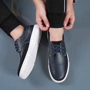 Men's plus size casual navy blue leather board shoes with white thick soles.