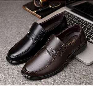 Close-up view of premium black and brown leather business casual shoes with soft soles