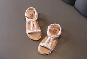 Elegant pink girls' Roman sandals decorated with pearls and rhinestones for summer