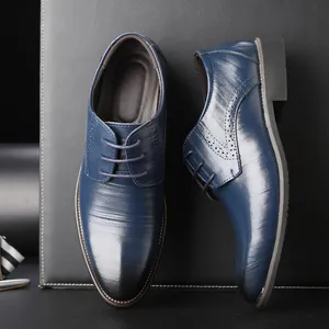 Chaussures de ville élégantes en cuir bleu pour hommes avec détails brogues chic