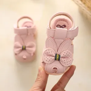 Pink baby girl princess sandals with cute rabbit ears and soft non-slip walking sole.