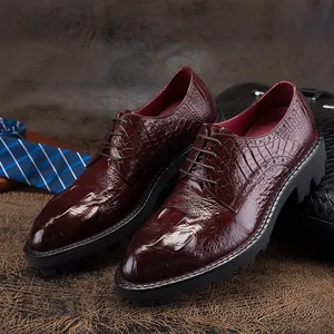 Burgundy crocodile embossed leather men's dress shoes with thick rubber lug soles