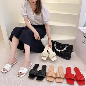 Elegant summer woven strap flat sandals for women shown in various vibrant colors