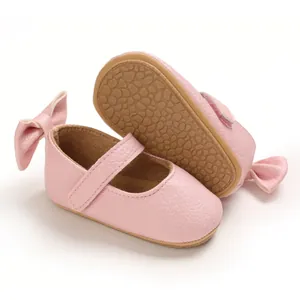 Weiche rosa Baby-Lauflernschuhe aus Lederimitat mit süßer Schleife und flexibler Gummisohle