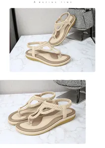 Detailed view of beige Bohemian T-strap sandals with braided straps and elastic back.