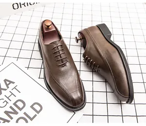 Close-up of brown leather men's oxford dress shoes with elegant wooden shoe trees inside