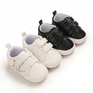 Chaussures souples premier pas bébé noir et blanc avec broderie étoile et attaches velcro