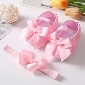 Set of pink baby lace princess shoes and matching bow headband for infant girls