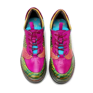 Top view of vintage multi-colored leather loafers for women with artistic patterns
