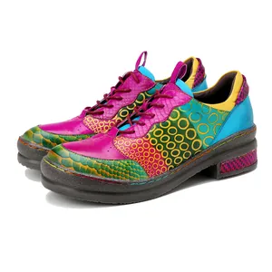 Detail of colorful patchwork genuine leather retro loafers for women with thick sole.