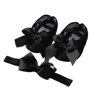 Elegant black baby princess shoes and matching headband set with large grosgrain ribbon bows