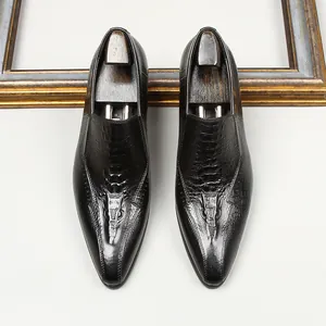 Men's elegant black crocodile embossed leather loafers with pointed toe and formal style.