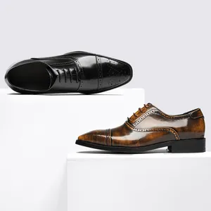 Klassische Brogue-Herrenschuhe aus poliertem Leder in Schwarz und Vintage-Braun.