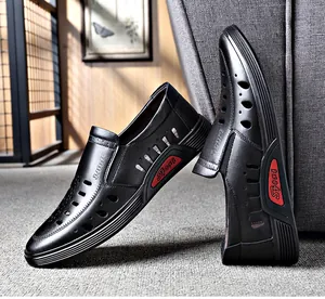 Detailed shot of breathable black leather men's sandals with hollow-out business design